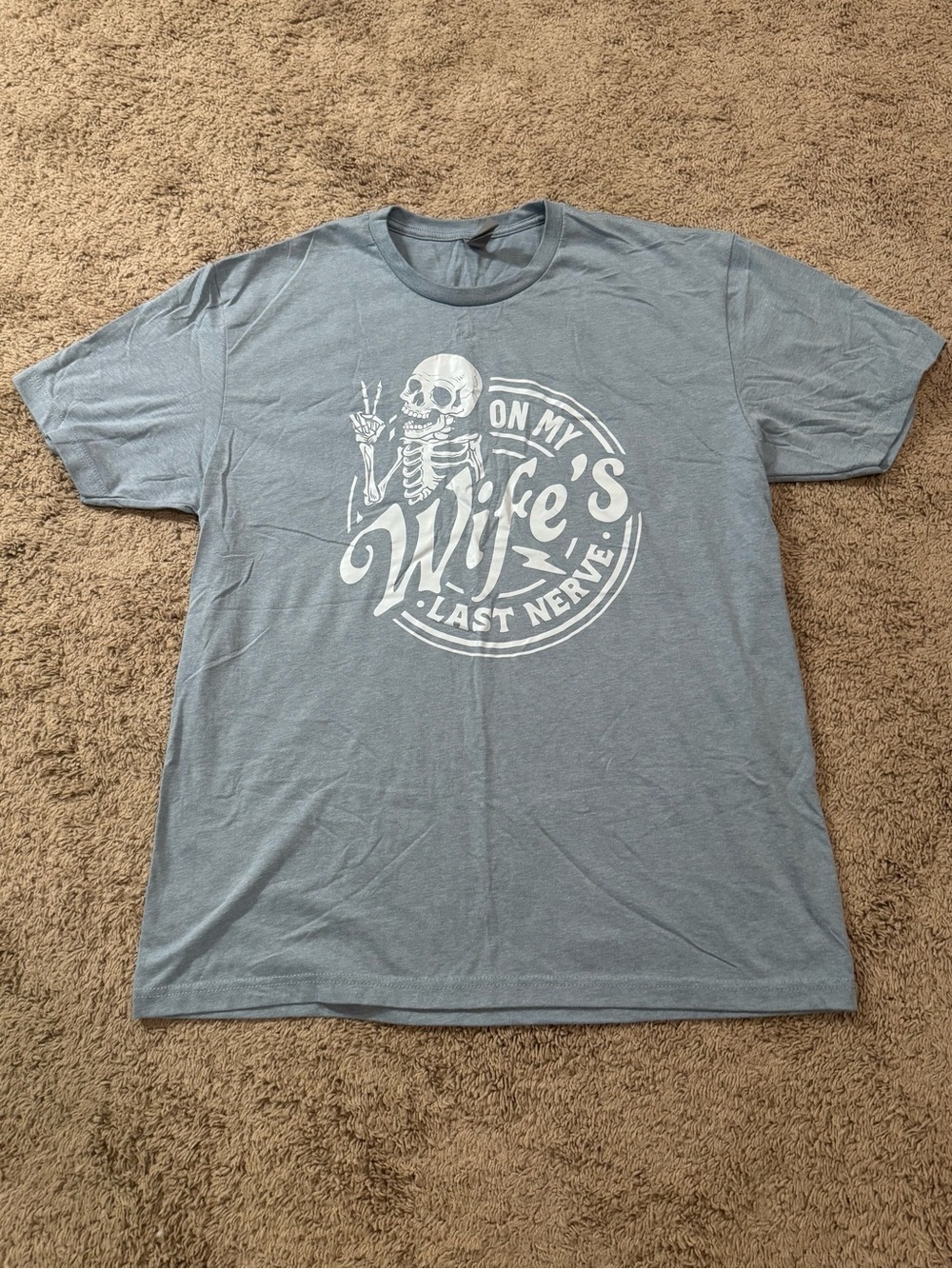 Next Level Apparel Light Blue Graphic Tee with White Skeleton Print